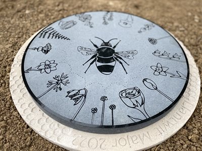 Bee Hapus Garden Central frottage Stone designed by local resident Lily Mae Starkey